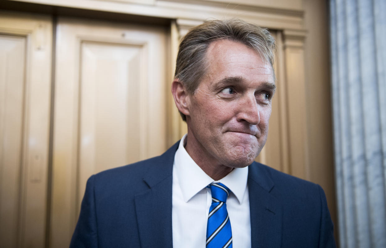 Republican Sen. Jeff Flake speaks with reporters after a vote in the Capitol in July. (Photo: Bill Clark/CQ Roll Call via Getty Images)