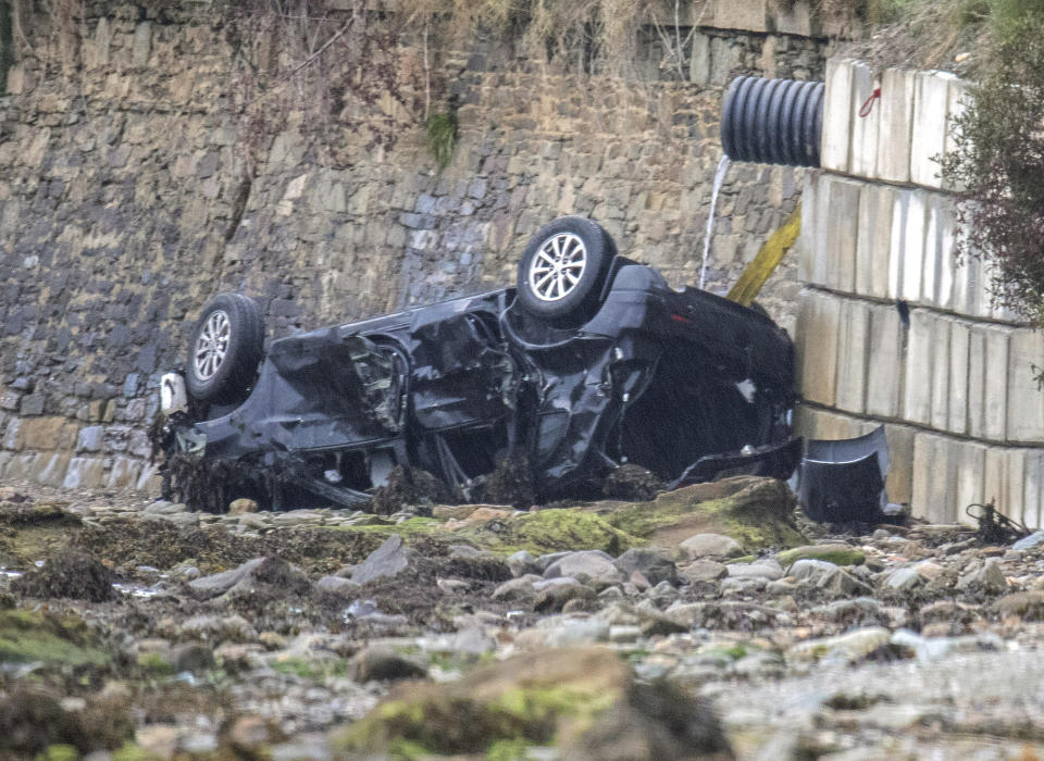 The wreckage of the car in which three people lost their lives in. (PA)