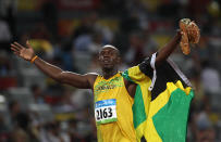 <p>At the 2008 Beijing Olympics, Jamaican sprinter Usain Bolt broke the world and Olympic records in the 100-meter and 200-meter. He also set a 4×100-meter relay record, becoming the first athlete to win three sprinting events at a single Games since Carl Lewis in 1984. (Getty) </p>