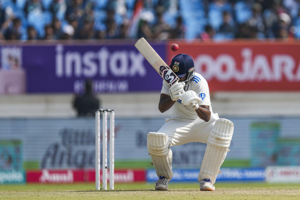 India's Ravichandran Ashwin ducks to avoid a bouncer on the second day of the third cricket test match between India and England in Rajkot, India, Friday, Feb. 16, 2024. (AP Photo/Ajit Solanki)