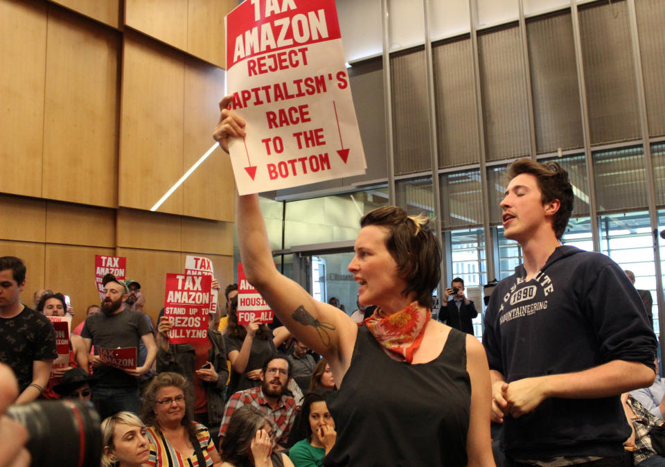 People protesting on May 14 during a Seattle City Council vote on a new "head tax" on big businesses in the city to help fund homelessness services. Amazon&nbsp;campaigned strongly against the tax. (Photo: Reuters Staff / Reuters)