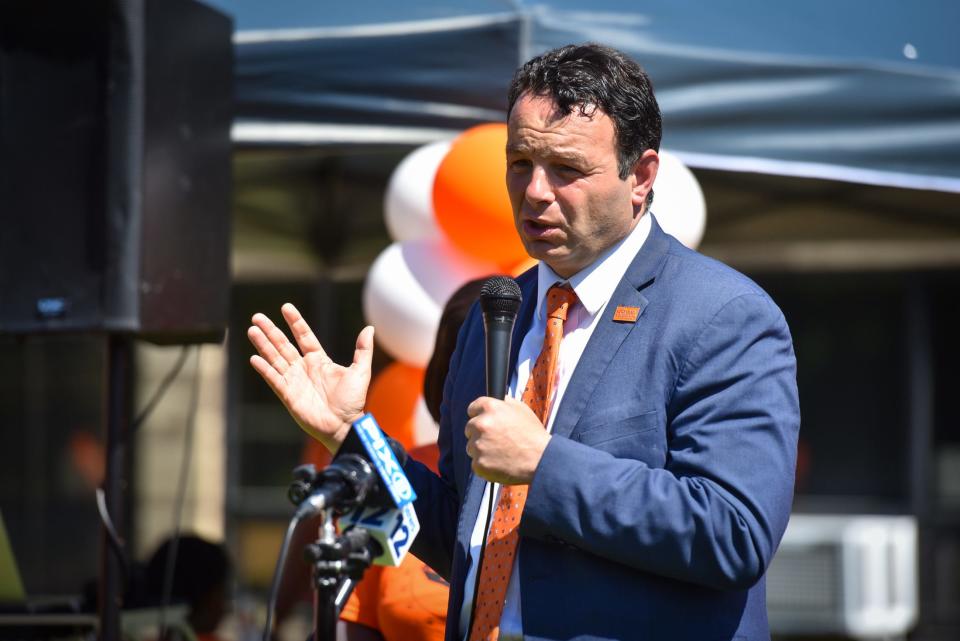 HARP Academy in Paterson holds a Gun Violence Awareness Walk in honor of Robert Cuadra. Cuadra, a HARP Academy senior who had been accepted to Montclair State University, on scholarship, was killed by gun violence in January 2022, while helping his grandmother unload with groceries. Paterson Mayor Andre Sayegh speaks to students before the walk on June 6, 2022.