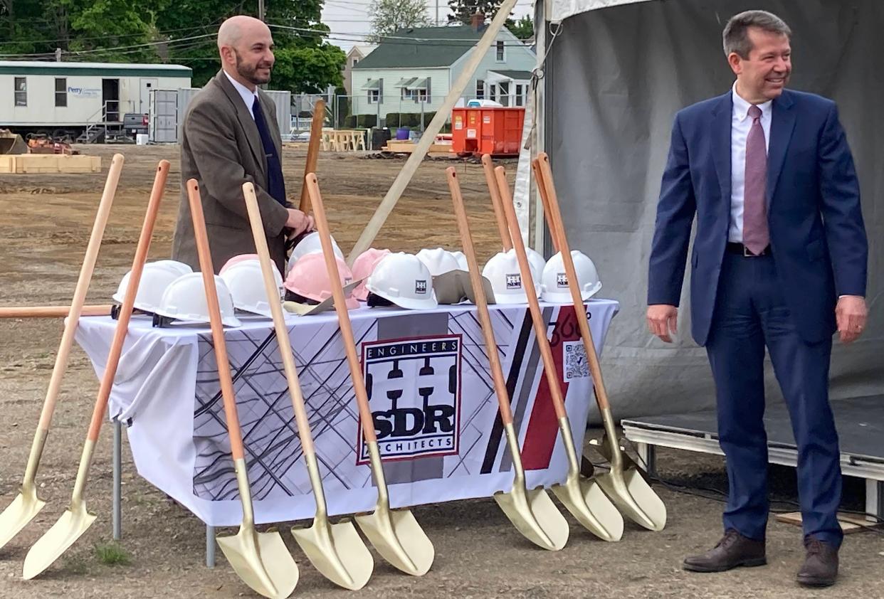 Erie School District Superintendent Brian Polito, right, gets ready to grab a shovel with Neal Brokman, the district's assistant superintendent for operations, at the groundbreaking ceremony for the new Edison Elementary School on East Lake Road on Monday. In the background is the construction site, just south of the existing school.