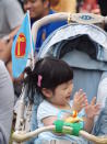 A child at the Workers' Party rally. (Yahoo! photo/ Aeron Chew)