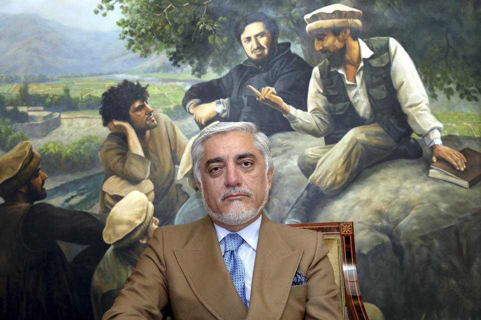 In this Thursday, Sept. 26, 2019 photo, Abdullah Abdullah a candidate in Afghanistan's upcoming presidential election poses for a photo during an interview at his home, in Kabul, Afghanistan. While there will be 18 names on the presidential ballot when Afghans go to the polls on Sept. 28 only five, including Abdullah, have been campaigning after several suspended their campaigns believing a peace deal with the Taliban was imminent. (AP Photo/Ebrahim Noroozi)