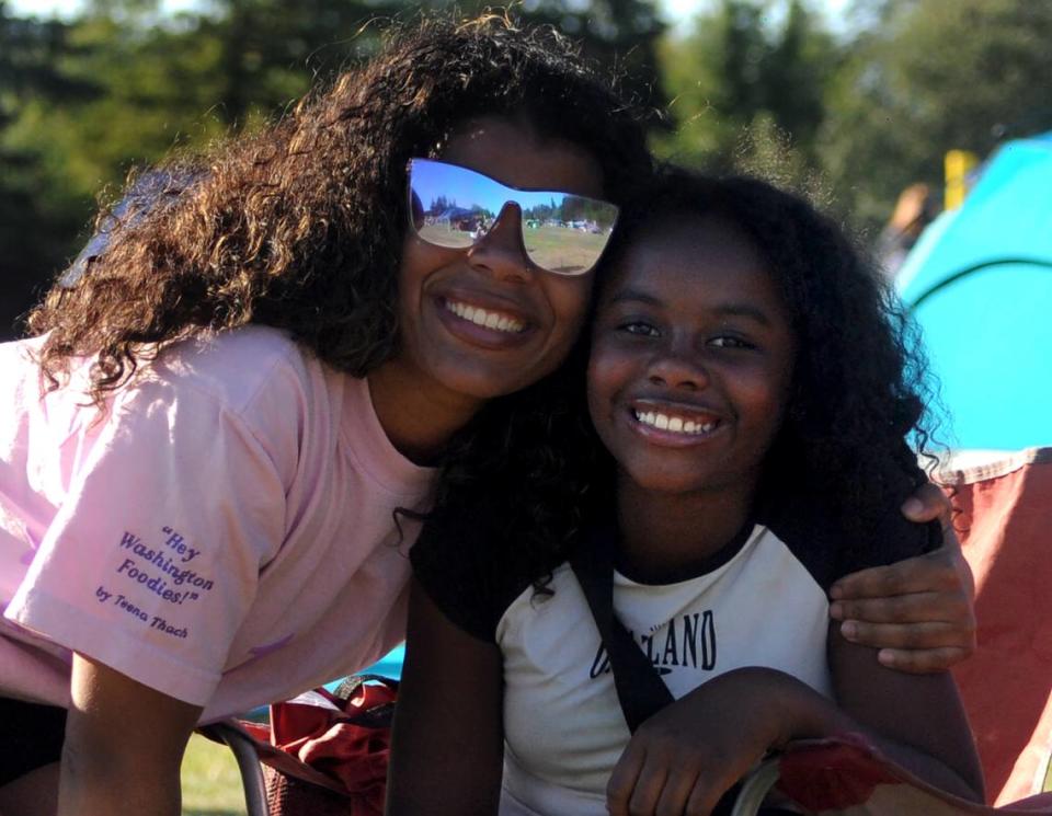 Rochelle Fernandus and a family member at the Tumwater Family Festival and Nisqually Red Wind Casino Fireworks Show on Thursday.