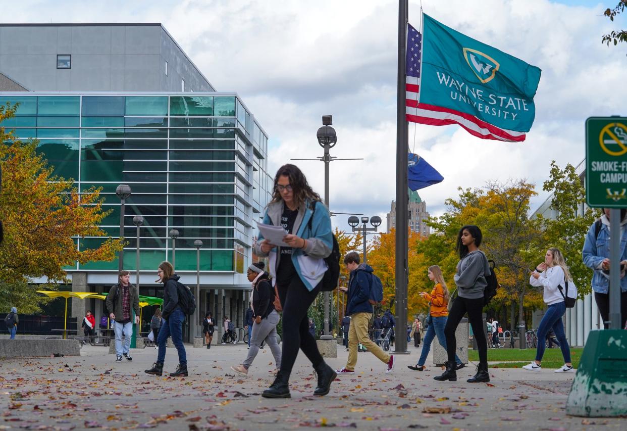 Students walk through the Wayne State University Campus in Detroit on Tuesday, October 22, 2019.