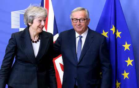 British Prime Minister Theresa May and European Commission President Jean-Claude Juncker leave to discuss draft agreements on Brexit, at the EC headquarters in Brussels, Belgium November 21, 2018. REUTERS/Francois Walschaerts