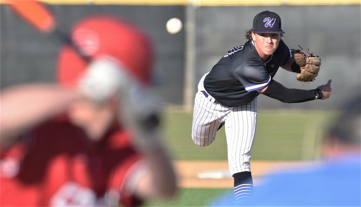 Wylie reliever Grayson Bearden throws a pitch to a Wichita Falls High batter in the fourth inning. Bearden and starter Tye Briscoe combined on a three-hitter in the Bulldogs' 10-0 win over the Coyotes on March 10 on the opening day of the Abilene ISD Invitational at Blackburn Field.