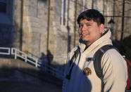 Jesus Noyola, a sophomore attending Rensselaer Polytechnic Institute, poses for a portrait outside the Folsom Library, Tuesday, Feb. 13, 2024, in Troy, N.Y. A later-than-expected rollout of a revised Free Application for Federal Student Aid, or FASFA, that schools use to compute financial aid, is resulting in students and their parents putting off college decisions. Noyola said he hasn’t been able to submit his FAFSA because of an error in the parent portion of the application. “It’s disappointing and so stressful since all these issues are taking forever to be resolved,” said Noyola, who receives grants and work-study to fund his education. (AP Photo/Hans Pennink)