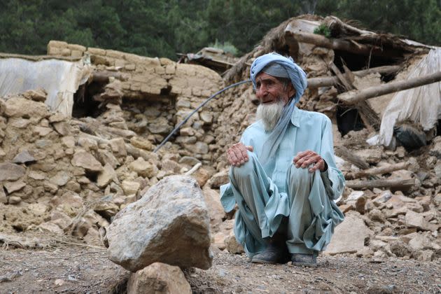 An elder in Khost, Afghanistan, reacts to the devastation after an earthquake shook the country on June 22, 2022. The district chief, Sultan Mahmood Ghaznavi, said the quake had destroyed about 500 houses in the area. (Photo: Sardar Shafaq/Anadolu Agency via Getty Images)