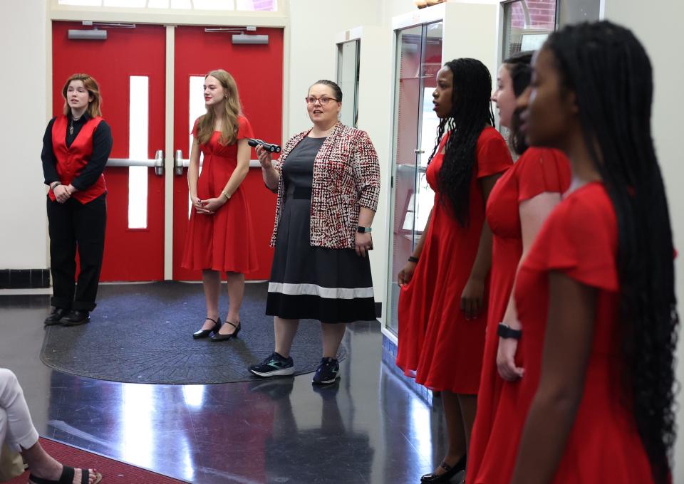Chorus teacher Tabitha Peck leads chorus students in song at Leon High School at a reunion for the class of 1951 Saturday, Sept. 17, 2022.