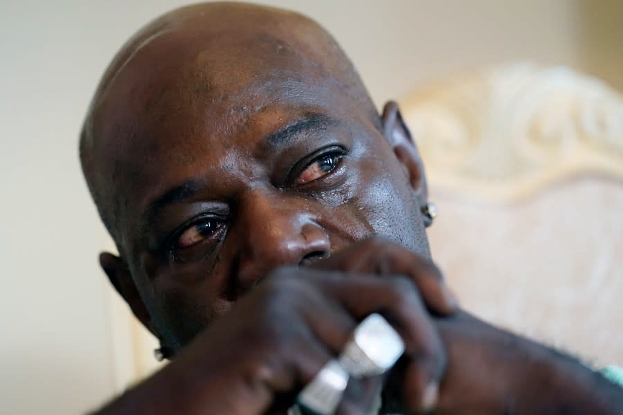 FILE – Aaron Larry Bowman cries during an interview at his attorney’s office in Monroe, La., Aug. 5, 2021, as he discusses his injuries resulting from a Louisiana State trooper pummeling him during a traffic stop in 2019. A federal jury in Louisiana on Wednesday, Aug. 2, 2023, acquitted a white state trooper charged with violating the civil rights of Bowman despite body camera footage that captured the officer pummeling him 18 times with a flashlight. (AP Photo/Rogelio V. Solis, File)