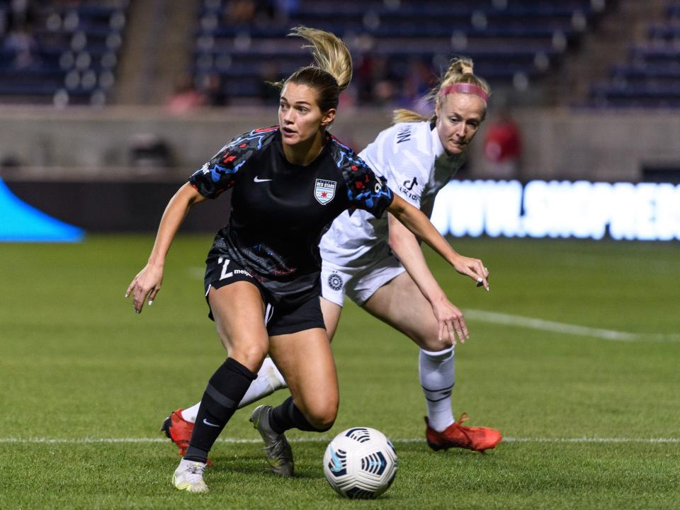 Kealia Watt (left) outmaneuvers Portland Thorns defender and USWNT captain Becky Sauerbrunn during a game with the Red Stars.