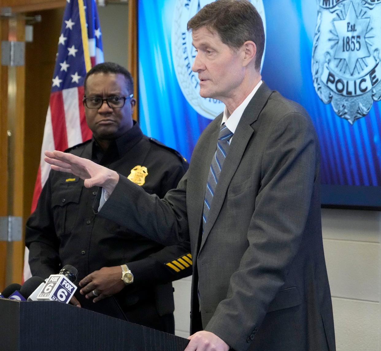 Milwaukee County District Attorney John Chisholm (right) with Milwaukee Police Chief Jeffery Norman announce charges against a violent group of individuals during a press conference at the Milwaukee Police Administration Building on Monday.