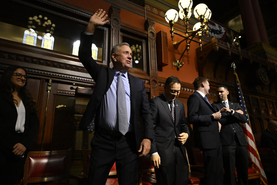Connecticut Gov. Ned Lamont waves after delivering the State of the State address at the State Capitol, Wednesday, Feb. 7, 2024, in Hartford, Conn. (AP Photo/Jessica Hill)