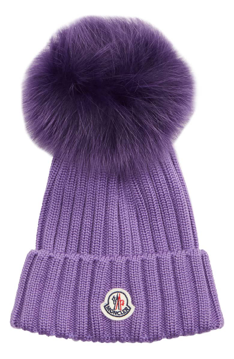 <p><strong>Moncler</strong></p><p>nordstrom.com</p><p><strong>$350.00</strong></p><p><a rel="nofollow noopener" href="https://shop.nordstrom.com/s/moncler-genuine-fox-fur-pom-wool-beanie/5095258" target="_blank" data-ylk="slk:Shop Now;elm:context_link;itc:0;sec:content-canvas" class="link ">Shop Now</a></p><p>"As soon as you're done on the slopes, you'll want to ditch your ski gear for an après-worthy ensemble. Swap your helmet for a chic and cozy hat like this one by Moncler. They come in a range of bright colors with a cute pom on top, so you can stand out <em>and</em> stay warm as you enjoy your hard-earned après cocktail."<em>-Maggie Maloney, Associate Digital Editor</em></p>