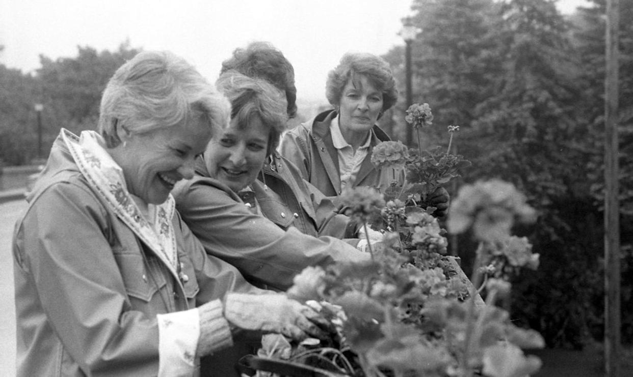 Members of the Petoskey Area Garden Club work on a community garden in 1986.