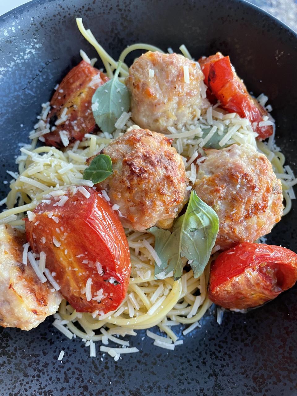 Chicken meatballs and spaghetti in a bowl