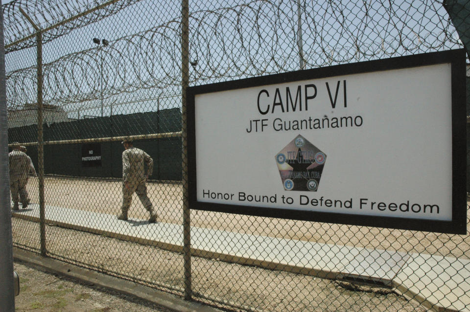GUANTANAMO BAY NAVAL BASE, CUBA - JULY 23: In this image reviewed by the U.S. Military, a sign marks one of the entrances to the Camp VI detention center July 23, 2008 at Guantanamo Bay U.S. Naval Base, in Cuba. The military base is providing the location for the trial of Salim Hamdan, the former driver for Osama bin Laden, who is charged with conspiracy and aiding terrorism and is the first prisoner to face a U.S. war-crimes trial since World War II. (Randall Mikkelsen-Pool/Getty Images)