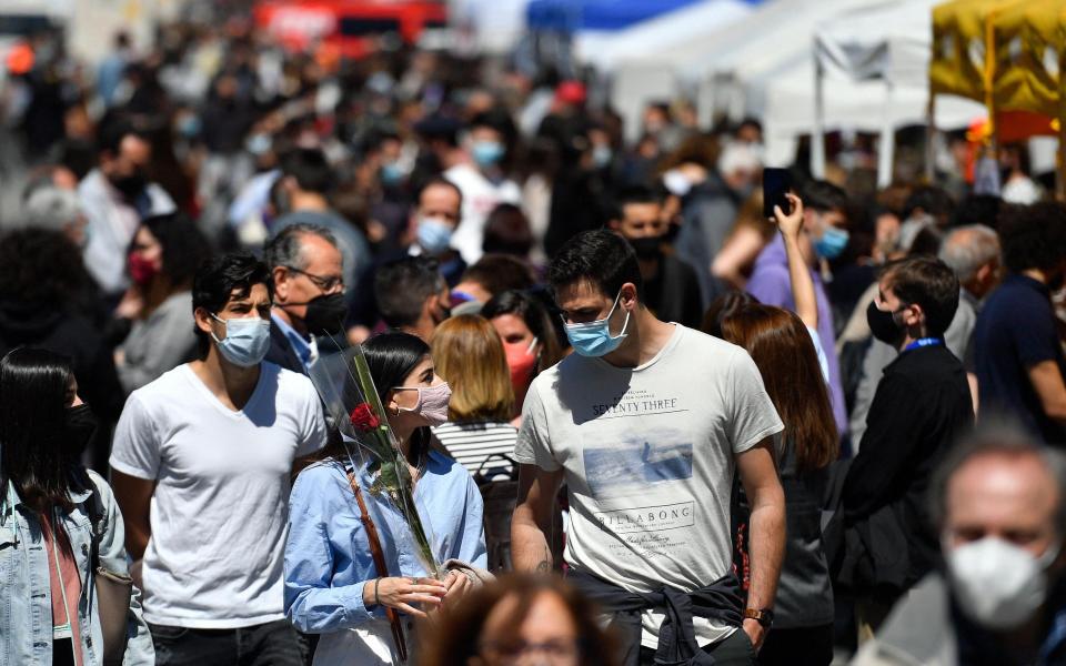 Face masks are mandatory in crowded outdoor spaces - Getty