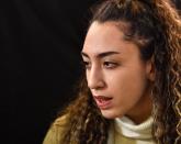 Iranian Taekwondo athlete Kimia Alizadeh speaks to the media at a press conference in Luenen, Germany, Friday, Jan. 24, 2020. Iran's only female Olympic medalist fled from the Islamic Republic and said she wants to compete for Germany. (AP Photo/Martin Meissner)