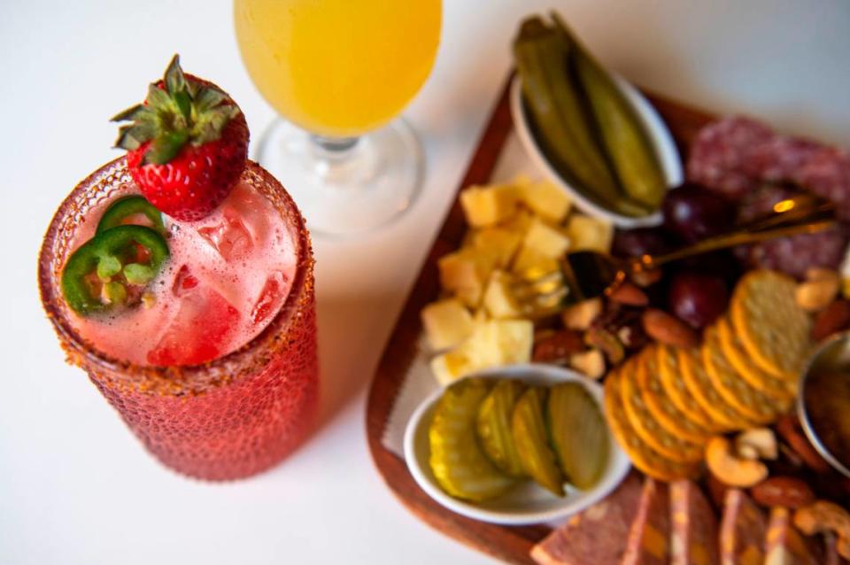 The Fire Bird Margarita, which contains tequila, jalapeño juice, strawberry puree, lime juice, citrus and tajin, at the Hen House in Bay St. Louis on Wednesday, May 29, 2024.