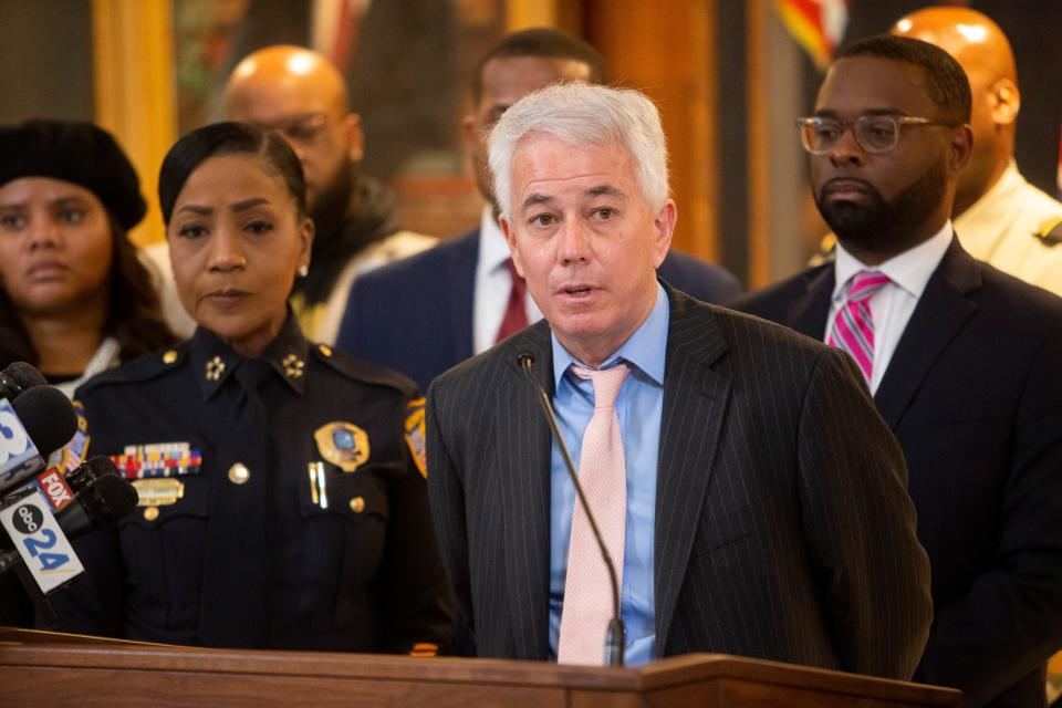 Shelby County District Attorney Steve Mulroy speaks to the media while surrounded by local and state officials after they met to discuss crime in Memphis at city hall in Memphis, Tenn., on Thursday, January 4, 2024.