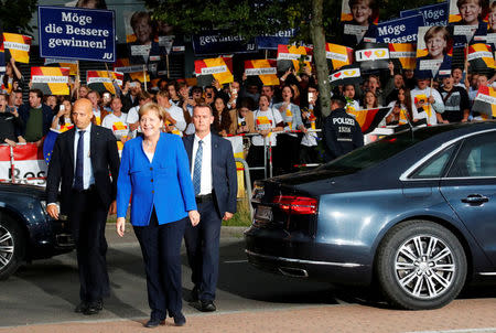 German Chancellor Angela Merkel of the Christian Democratic Union (CDU) arrives for a TV debate with her challenger Germany's Social Democratic Party SPD candidate for chancellor Martin Schulz in Berlin, Germany, September 3, 2017. REUTERS/Fabrizio Bensch