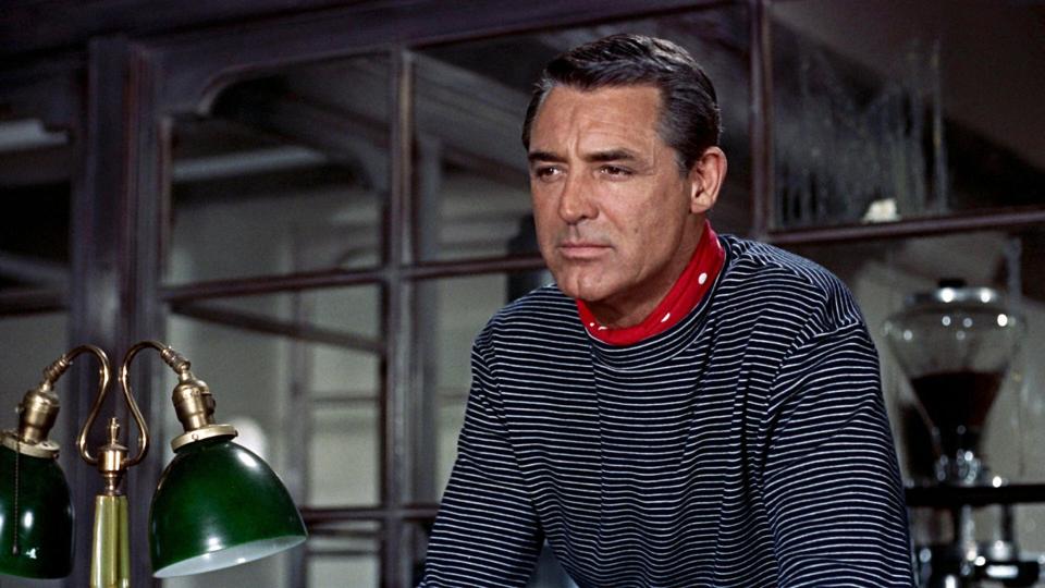 <p>The legendary actor's classic stripes paired perfectly with a silk scarf in the 1955 film. </p>