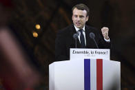 <p>Incoming French President Emmanuel Macron delivers a speech in front of the Pyramid at the Louvre Museum in Paris, Sunday, May 7, 2017. Macron says that France is facing an “immense task” to rebuild European unity, fix the economy and ensure security against extremist threats. (David Ramos/Getty Images) </p>