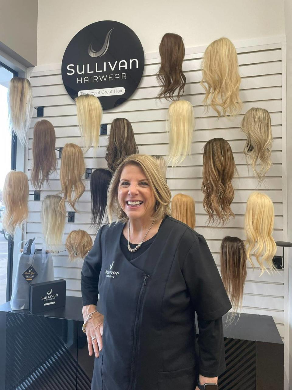 Robyn Sullivan at her new Sullivan Hairwear at the Offices at Cranbrook near 21st and Webb Road. Sullivan’s own journey fighting hair loss led her to start the business with her husband, Greg.