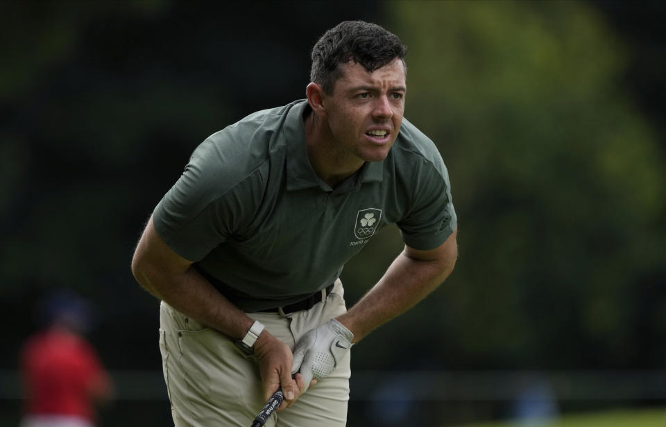 Rory McIlroy of Ireland watches his tee shot on the 6th hole during the second round of the men's golf event at the 2020 Summer Olympics on Friday, July 30, 2021, at the Kasumigaseki Country Club in Kawagoe, Japan. (AP Photo/Andy Wong)