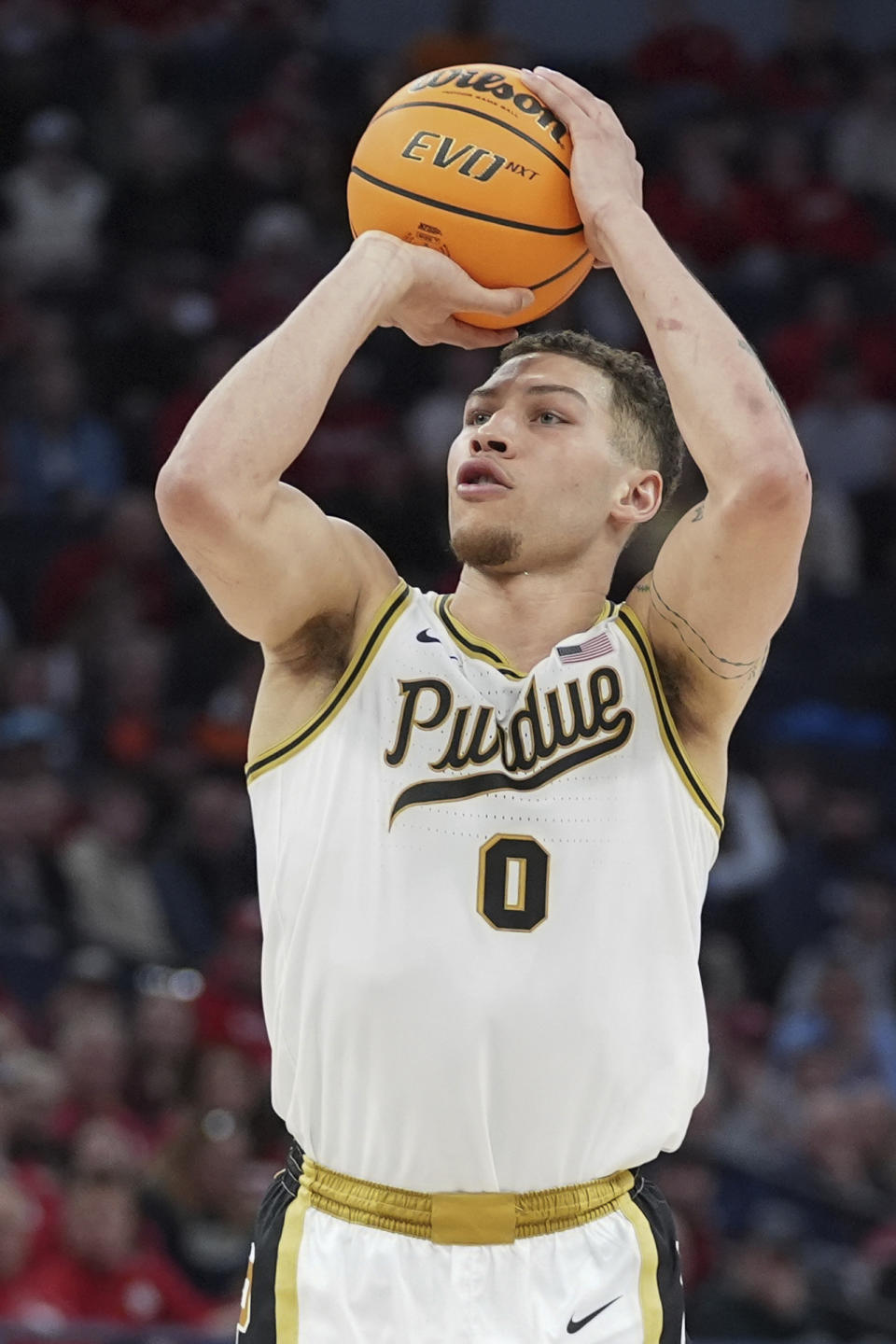 Purdue forward Mason Gillis (0) shoots during the first half of an NCAA college basketball game against Wisconsin in the semifinal round of the Big Ten Conference tournament, Saturday, March 16, 2024, in Minneapolis. (AP Photo/Abbie Parr)