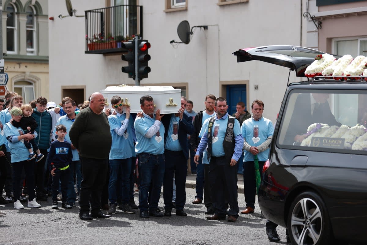 Kiea’s coffin is carried into the Sacred Heart Chapel (PA)