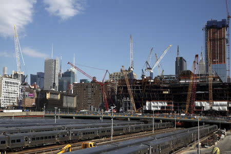 Construction cranes surround the base of the 30 Hudson Yards building, Wells Fargo & Co.'s future offices on Manhattan's west side in New York March 22, 2016. REUTERS/Brendan McDermid