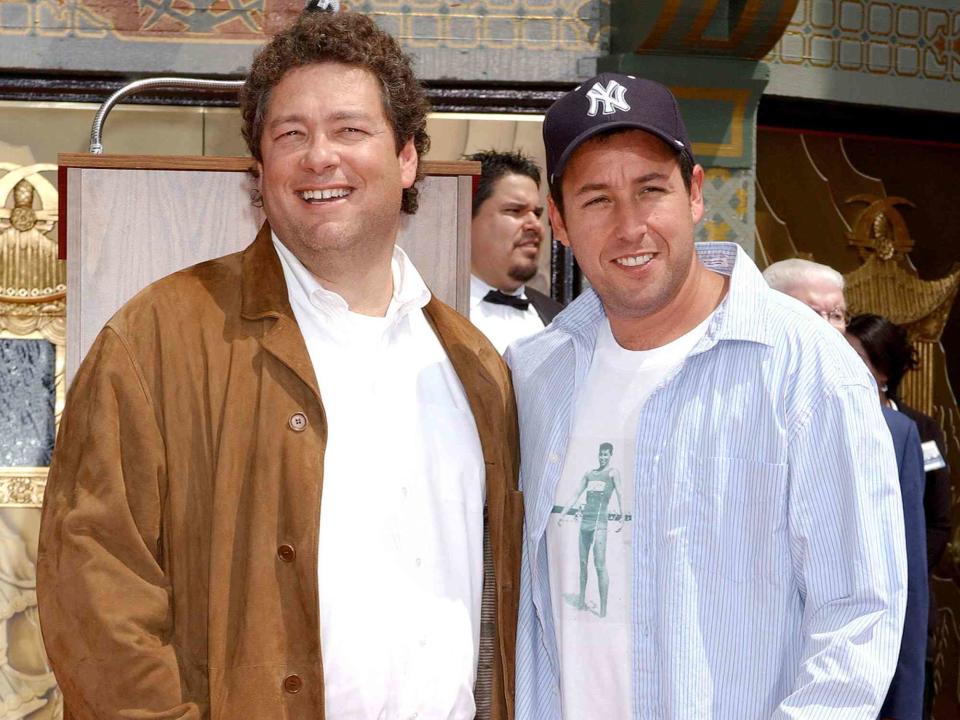 <p>Gregg DeGuire/WireImage</p> Adam Sandler and brother Scott during Adam Sandler