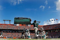 MIAMI GARDENS, FL - DECEMBER 11: Michael Vick #7 of the Philadelphia Eagles passes during a game against the Miami Dolphins at Sun Life Stadium on December 11, 2011 in Miami Gardens, Florida. (Photo by Mike Ehrmann/Getty Images)