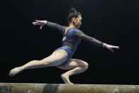 Sunisa Lee performs on the balance beam during the Winter Cup gymnastics competition, Saturday, Feb. 27, 2021, in Indianapolis. (AP Photo/Darron Cummings)