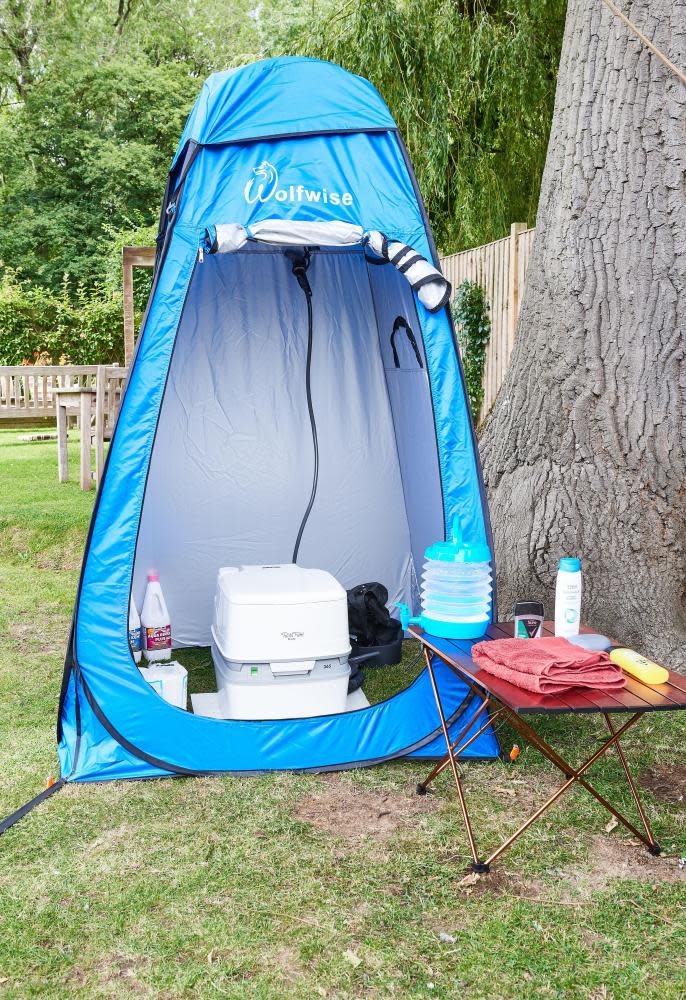 A portable toilet and shower tent