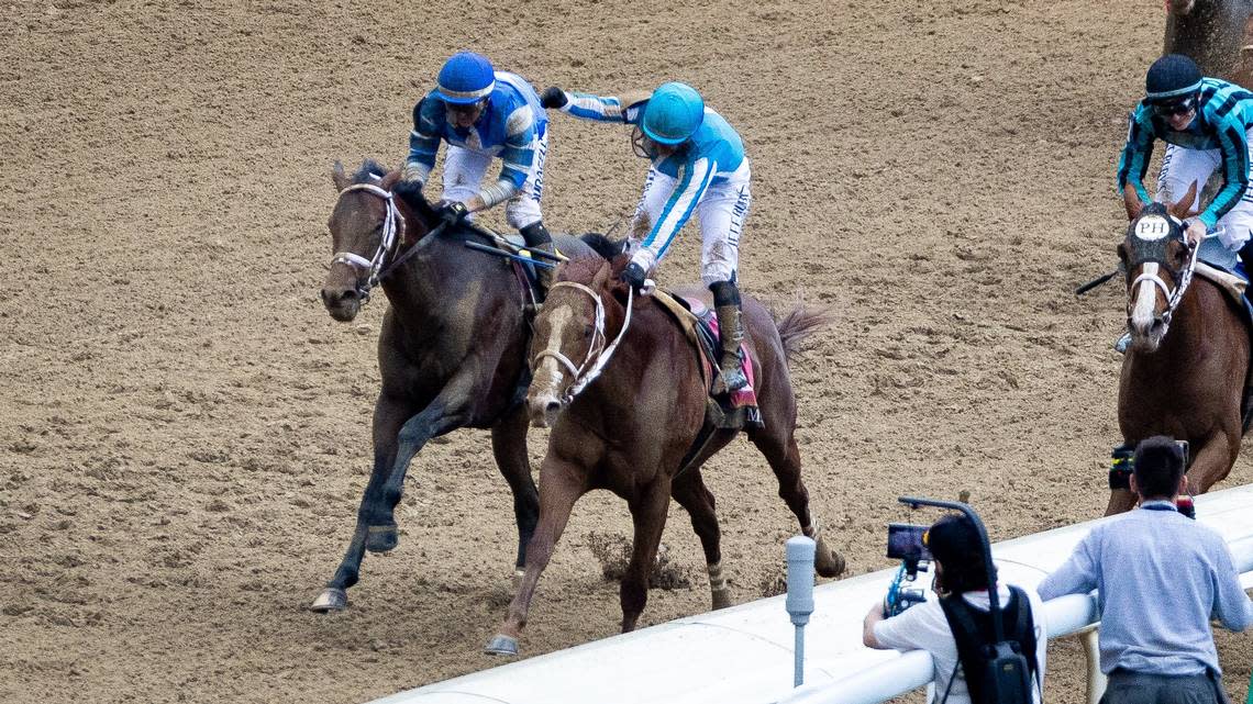 Javier Castellano celebrates after riding Mage past the finish line to win the 149th running of the Kentucky Derby at Churchill Downs on Friday, May 6, 2023, in Louisville, Ky. (Jack Weaver/Herald-Leader) Jack Weaver