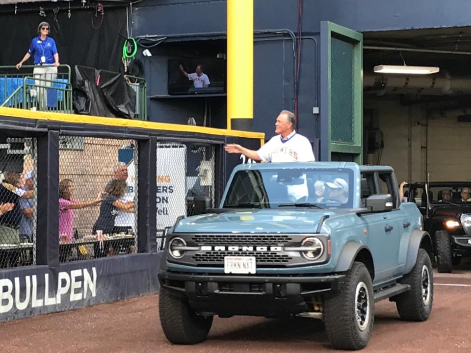 Former Brewers catcher and manager Ned Yost greets fans during a parade around the warning track cat American Family Field commemorating the 40th anniversary of the 1982 Brewers World Series runner up at American Family Field on Aug. 5, 2022.