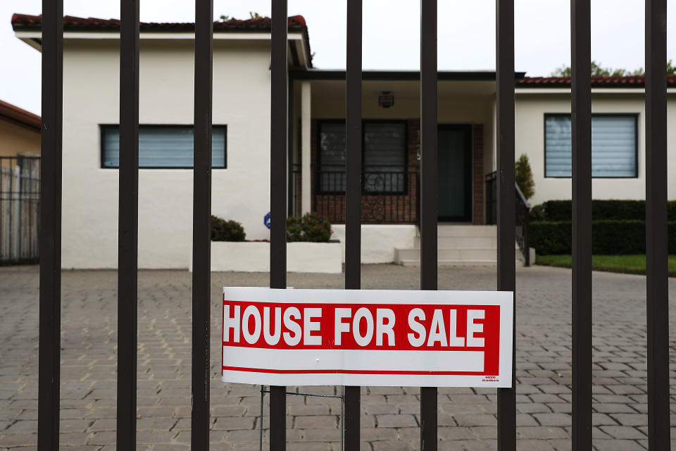 MIAMI, FLORIDA - JANUARY 30: A House For Sale sign is seen outside of a home on January 30, 2019 in Miami, Florida. The pending home sales index dropped 2.2 percent to 99.0, down from 101.2 in November, the weakest reading since April 2014 according to the National Association of Realtors. (Photo by Joe Raedle/Getty Images)