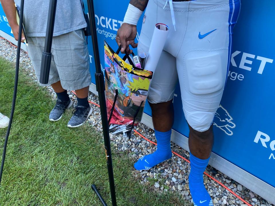 A bag of Naruto merchandise fans brought Lions running back Jamaal Williams on Aug. 2, 2022.