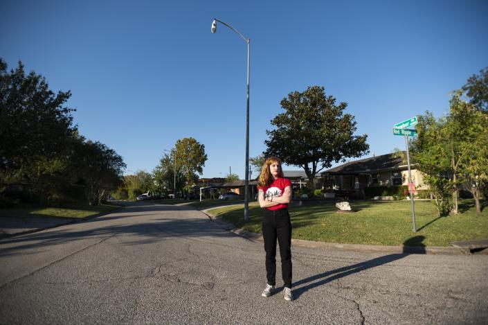 Molly Cook, an organizer with Stop TxDOT I-45, at the corner of Dowber Road and Red Ripple Road where a part of the Interstate 45 expansion is projected to run Friday, Nov. 19, 2021, in Houston. (AP Photo/Justin Rex)