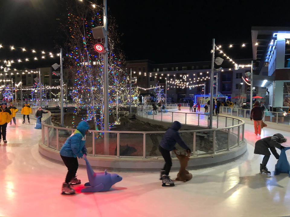 Skaters try out the new Ironworks Ice Rink on its opening night Dec. 3, 2022, at Mishawaka's Beutter Park.