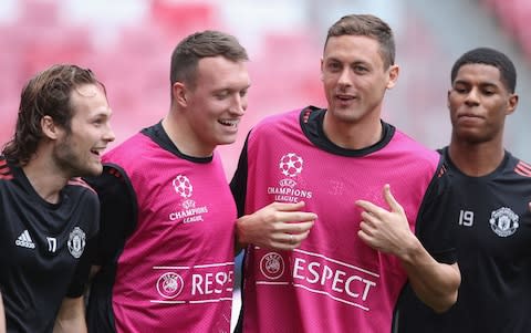 United in training and pink bibs - Credit: Matthew Peters/Man Utd via Getty Images