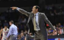 Baylor head coach Scott Drew points to his players during the first half of an NCAA college basketball game against Florida, Saturday, Jan. 25, 2020, in Gainesville, Fla. (AP Photo/Matt Stamey)