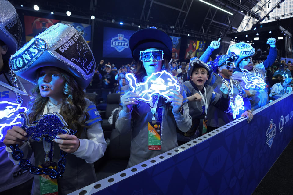 Detroit Lions fans attend the second night of the NFL football draft, Friday, April 26, 2024, in Detroit. (AP Photo/Paul Sancya)