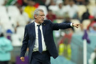 Portugal coach Fernando Santos gestures during the World Cup group H soccer match between Portugal and Uruguay, at the Lusail Stadium in Lusail, Qatar, Monday, Nov. 28, 2022. (AP Photo/Petr David Josek)